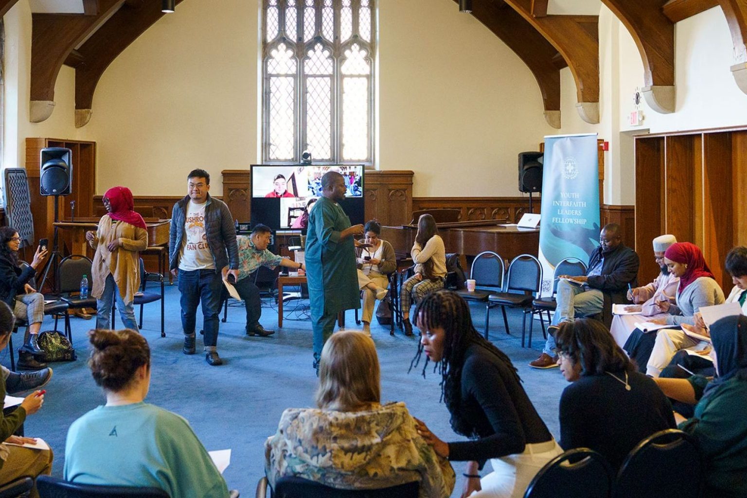 Participants in Faith for Our Planet Youth Fellows’ Retreat sitting in a circle