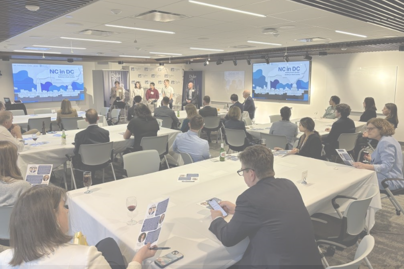 Participants sitting at tables during the Duke in DC: Building Extreme Weather Resiliency event.