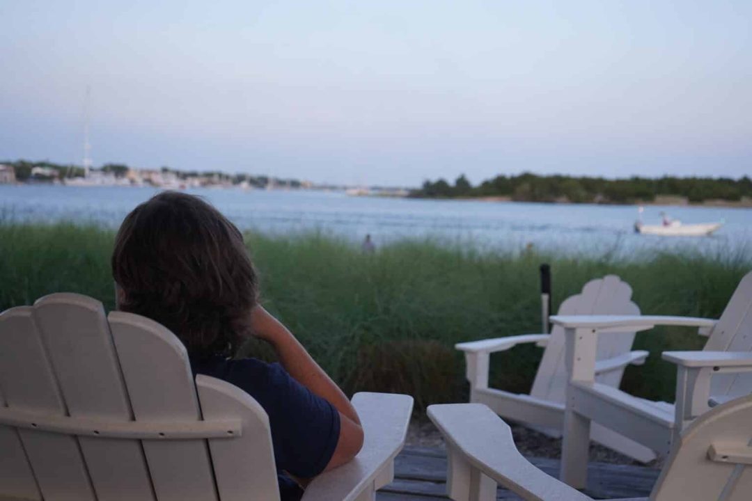 Person looking at water at Duke Marine Lab